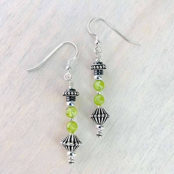 Decorative Silver Bead and Peridot Drop Earrings.