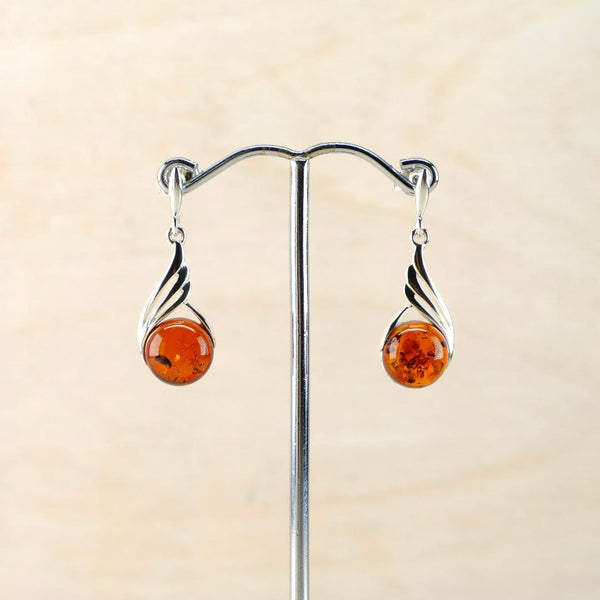 Amber and Sterling Silver Earrings with Angel Wings Settings.