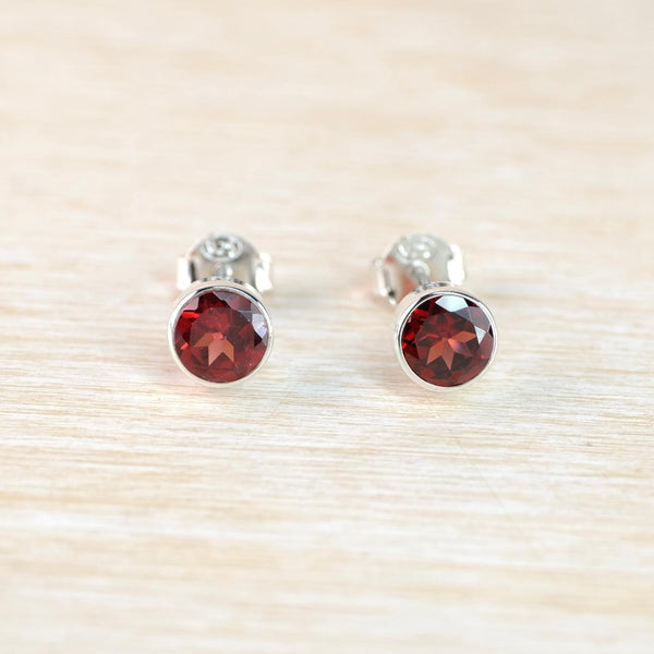Faceted Garnet and Sterling Silver Stud Earrings.