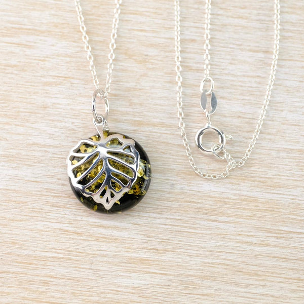 Round Green Amber and Sterling Silver Skeleton Leaf Pendant.