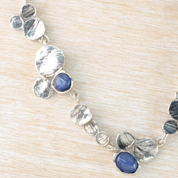 Organic Silver Disc and Kyanite Necklace by JB Designs.
