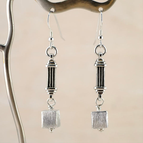 Silver Architectural Long Drop Earrings by Emily Merrix.