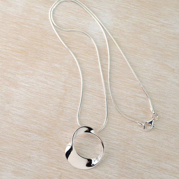 Sterling Silver Round Mobius Pendant by JB Designs.
