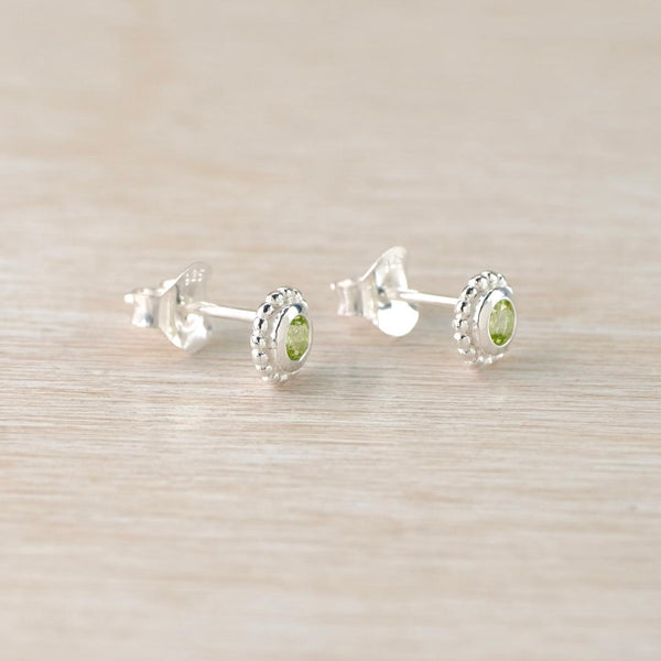 Sterling Silver Peridot Stud Earrings with Dotted Surround.