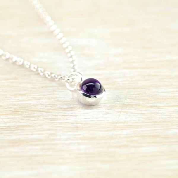Petite Birthstone Pendant in Sterling Silver and Amethyst.