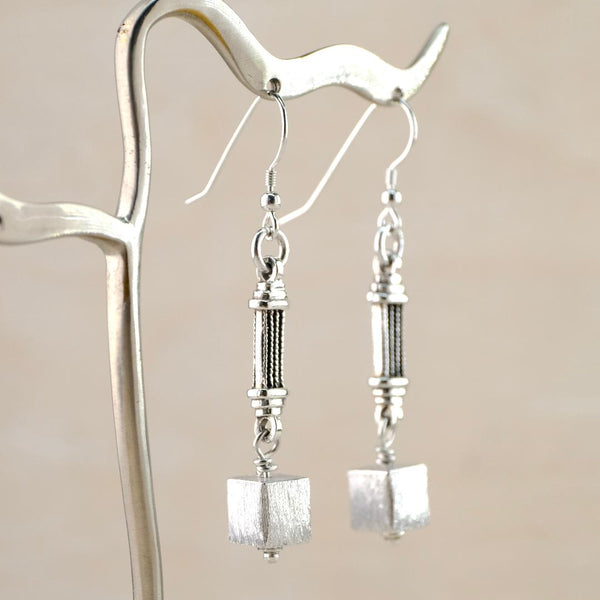 Silver Architectural Long Drop Earrings by Emily Merrix.