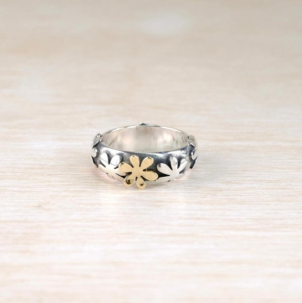 Silver and 9 ct Gold Flower Ring by Linda Macdonald.