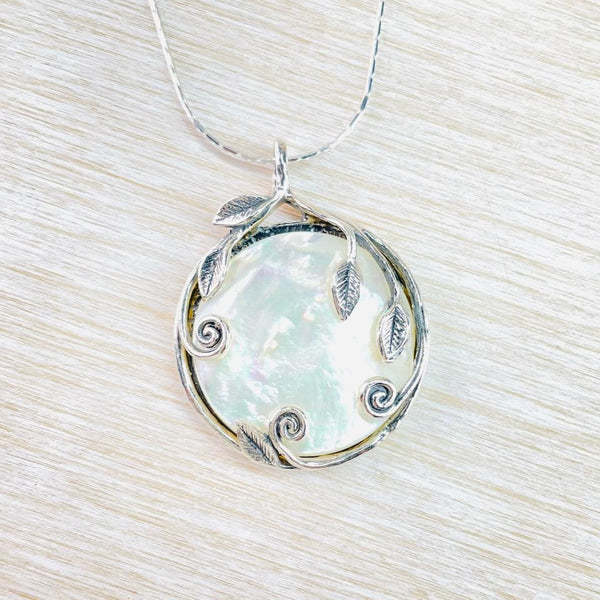 Decorative Sterling Silver and Mother of Pearl Pendant.