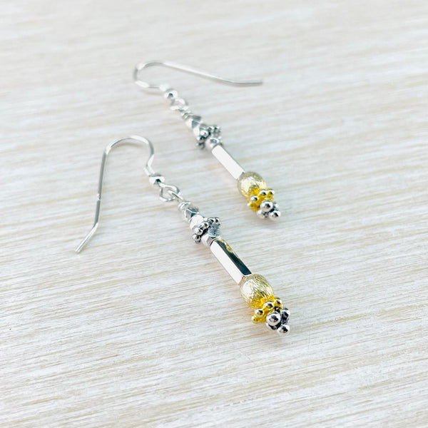 Sterling Silver, Oxidised Silver, and Gold Plated Bead Earrings by Emily Merrix.