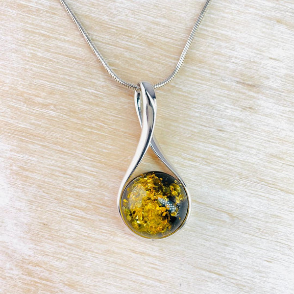 Green Amber and Sterling Silver Pendant.