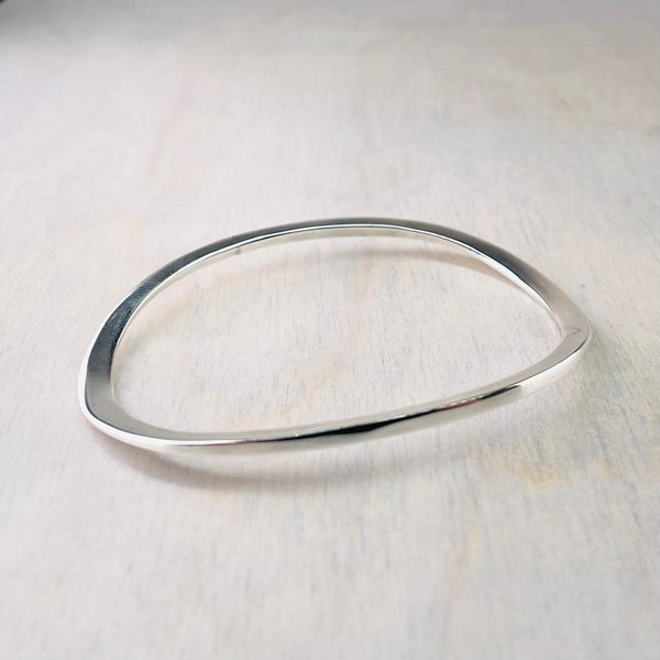 Curved Oval Sterling Silver Bangle.