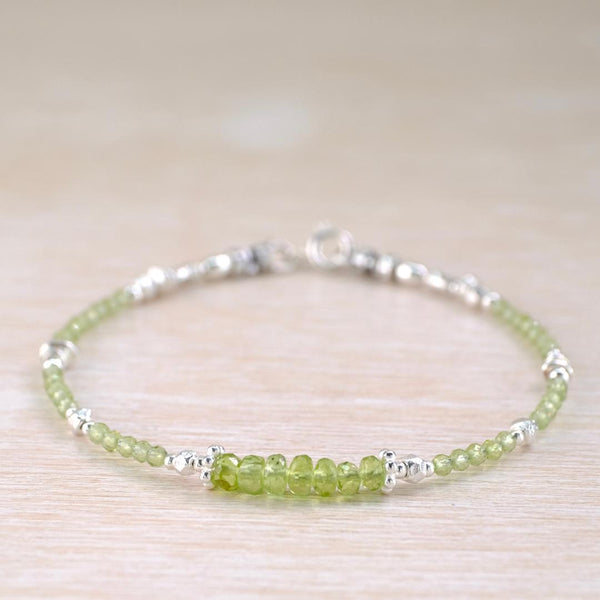 Fine Peridot Bracelet with Silver Beads.