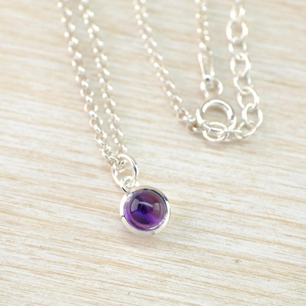 Petite Birthstone Pendant in Sterling Silver and Amethyst.