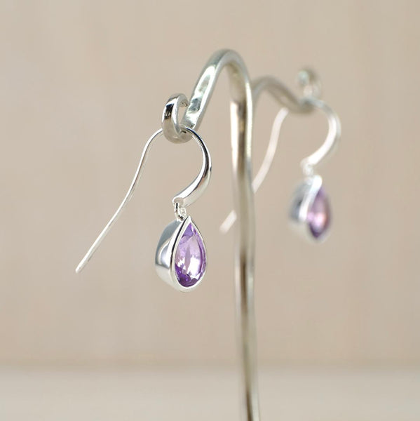 Tear Drop Shaped Faceted Amethyst Earrings Set in Silver By JB Designs.