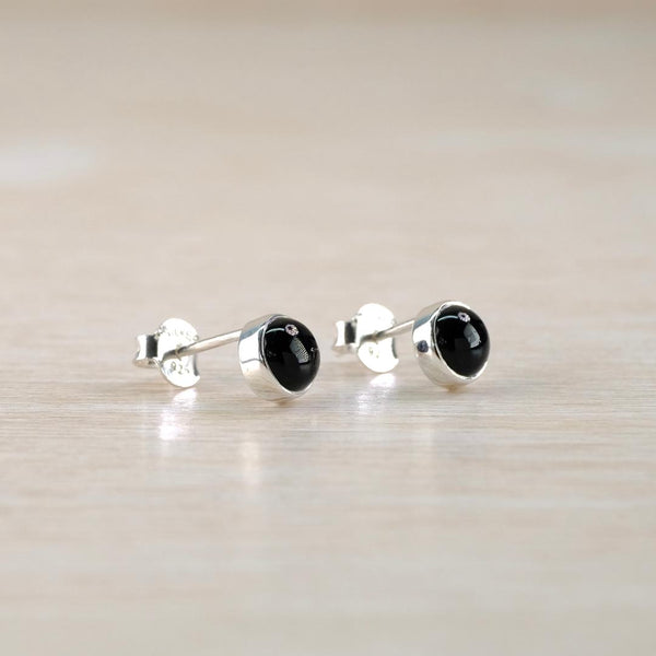 Small Sterling Silver and Black Onyx Stud Earrings.
