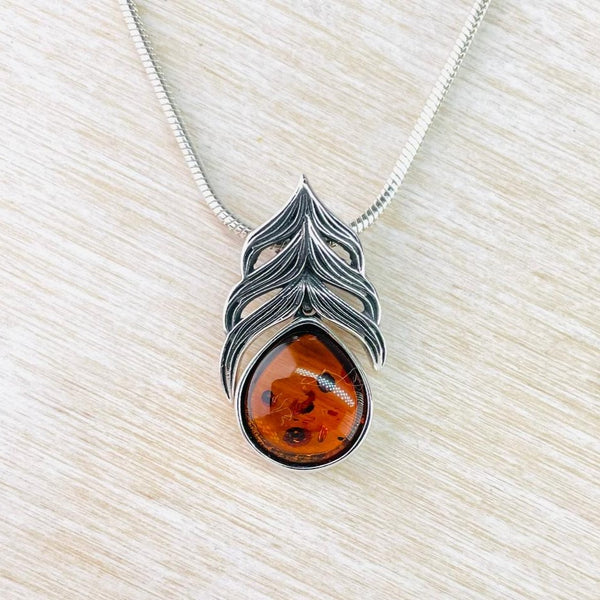 Amber and Sterling Silver Feather Pendant.