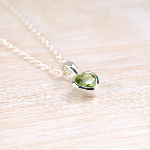 Petite Peridot Heart Pendant in Sterling Silver.