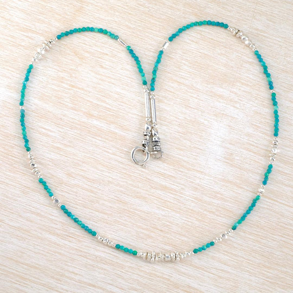 Necklace with little turquoise and silver  beads and silver clasp 