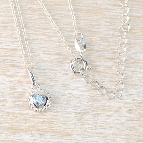 Sterling Silver and Blue Topaz Pendant Necklace.