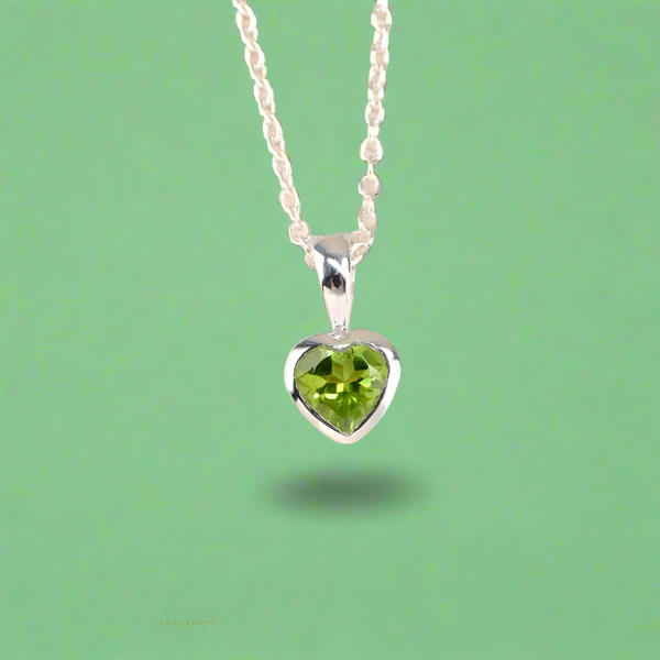 Petite Peridot Heart Pendant in Sterling Silver.