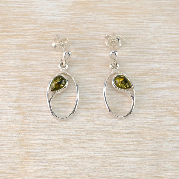 Open Oval Sterling Silver Earrings Set With Green Amber.