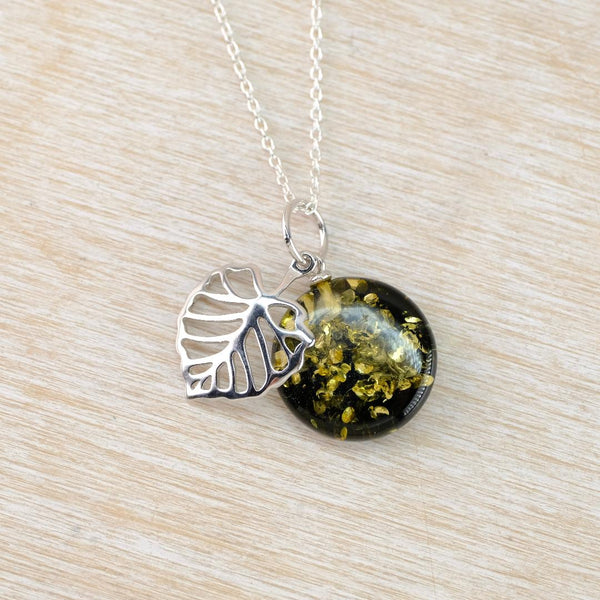 Round Green Amber and Sterling Silver Skeleton Leaf Pendant.
