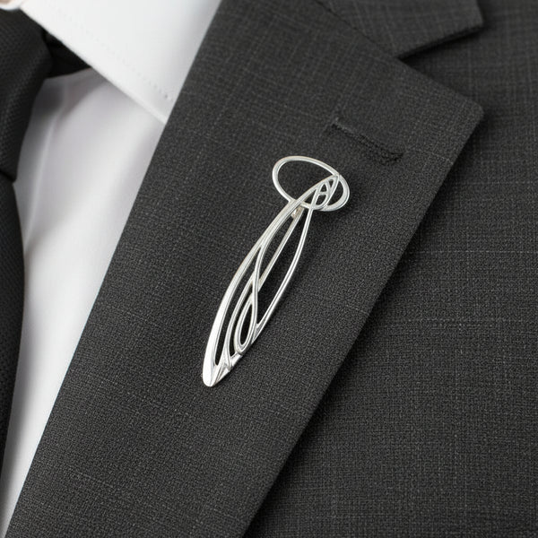Silver brooch on a lapel