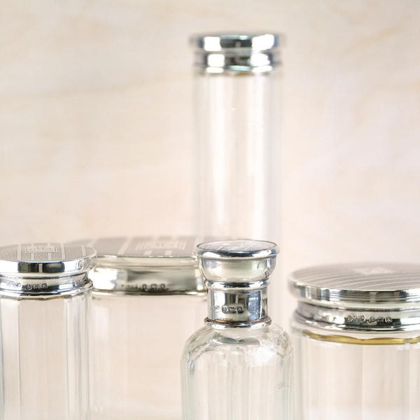 Five Art Deco Silver Topped Glass Pots,  Hallmarked in Birmingham, 1934