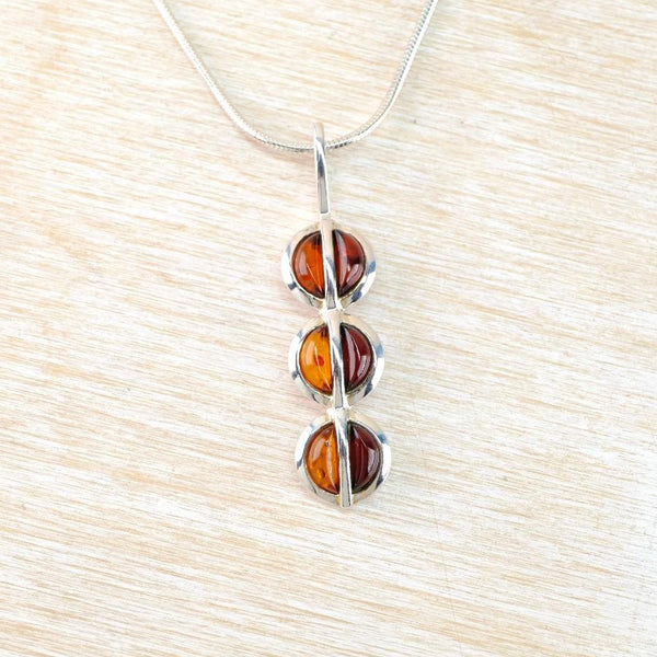 Three Circles of Baltic Amber and Sterling Silver Pendant Necklace.