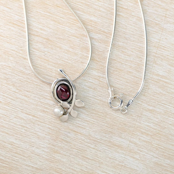 Silver, Cabochon Garnet and Pearl Pendant Necklace.