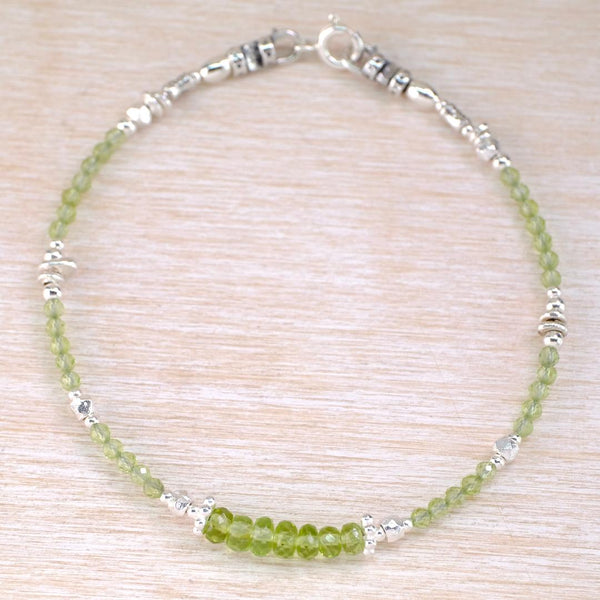 Fine Peridot Bracelet with Silver Beads.