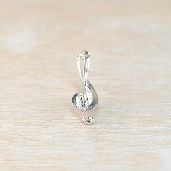 Sterling Silver and Amber Treble Clef Brooch.
