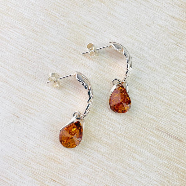 Curved Sterling Silver Leaf And Amber Drop Earrings.
