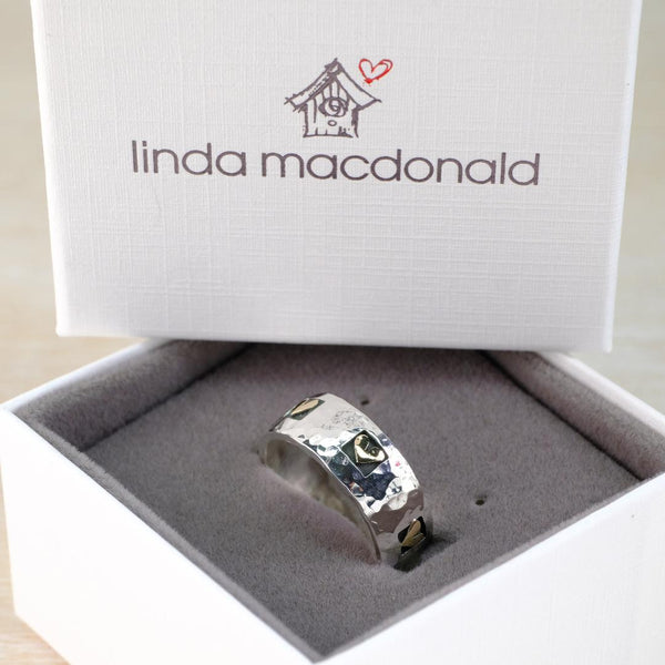 Linda Macdonald Hammered Silver Ring with Gold Hearts.
