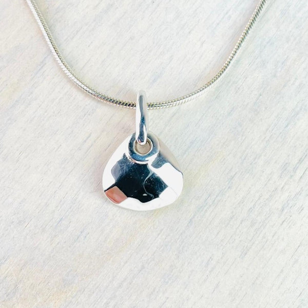 High Polish And Faceted Silver Pendant.