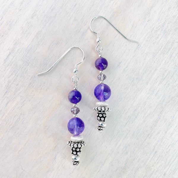 Amethyst, Crystal And Decorative Silver Bead Drop Earrings.