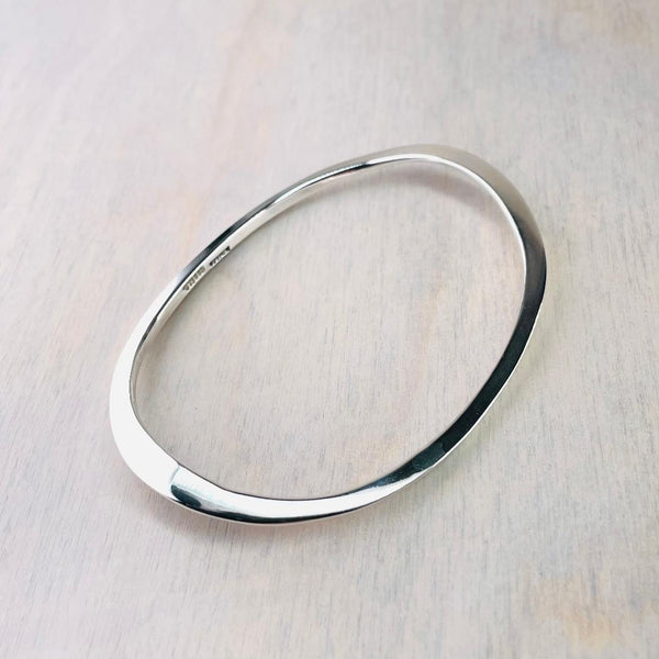 Curved Oval Sterling Silver Bangle.