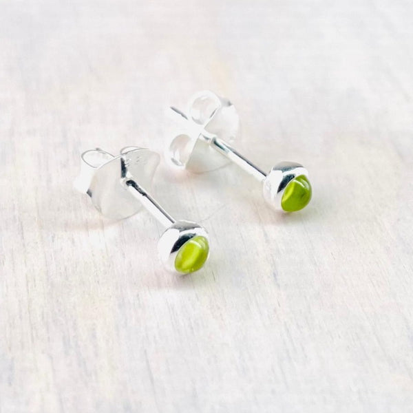 Tiny Silver and Peridot Stud Earrings.