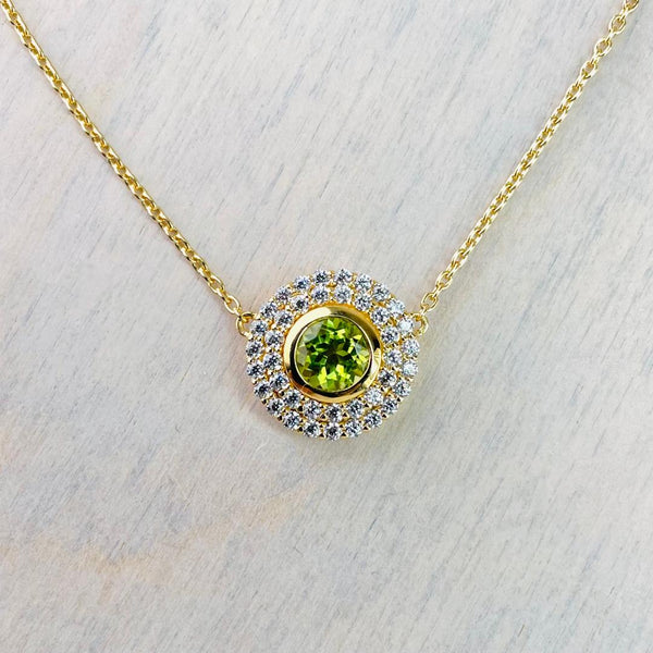 Peridot and Gold Plated Silver Necklace with CZ Surround.