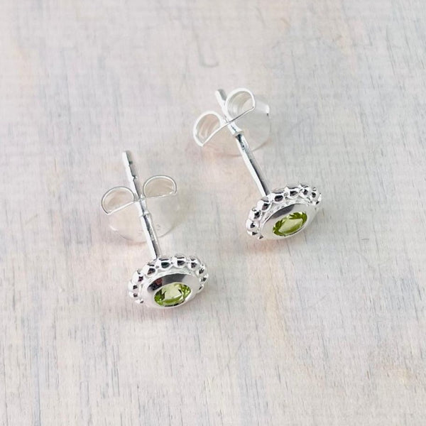 Small Round Silver and Peridot Stud Earrings.