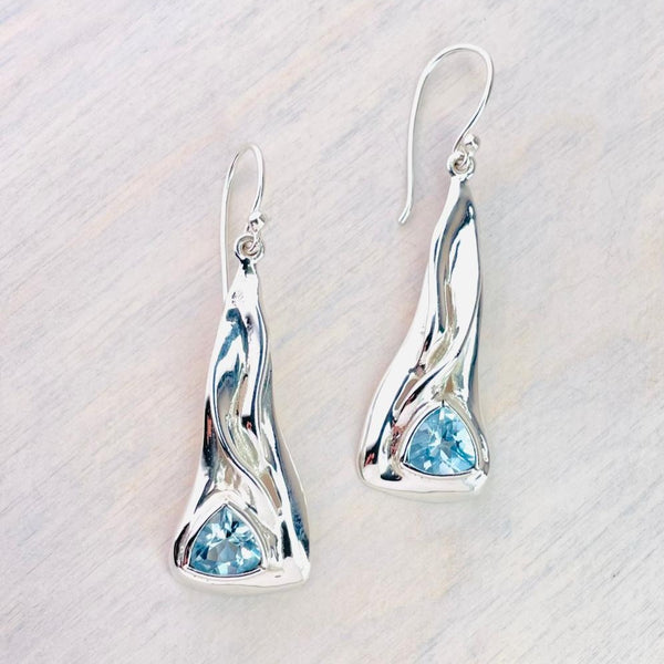 Silver and Trillion Cut Blue Topaz Drop Earrings.