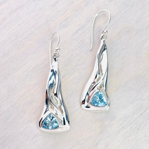 Silver and Trillion Cut Blue Topaz Drop Earrings.