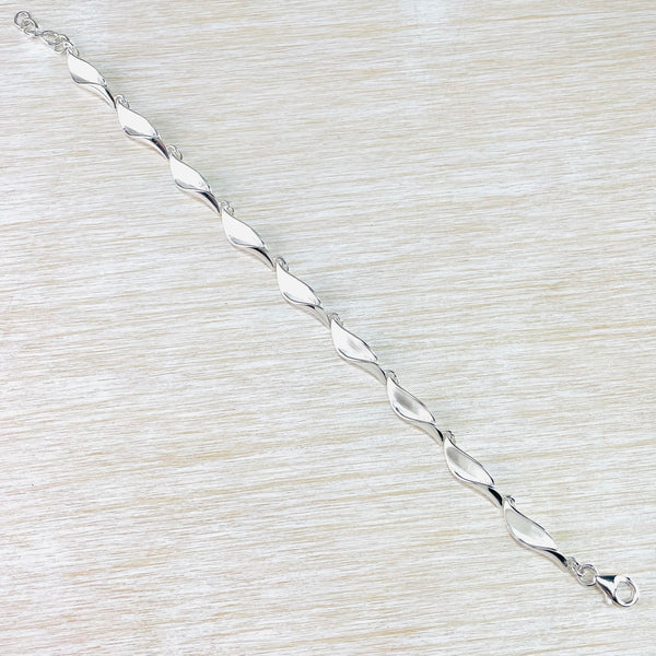 Sterling Silver Curved Leaf Design Bracelet by JB Designs.