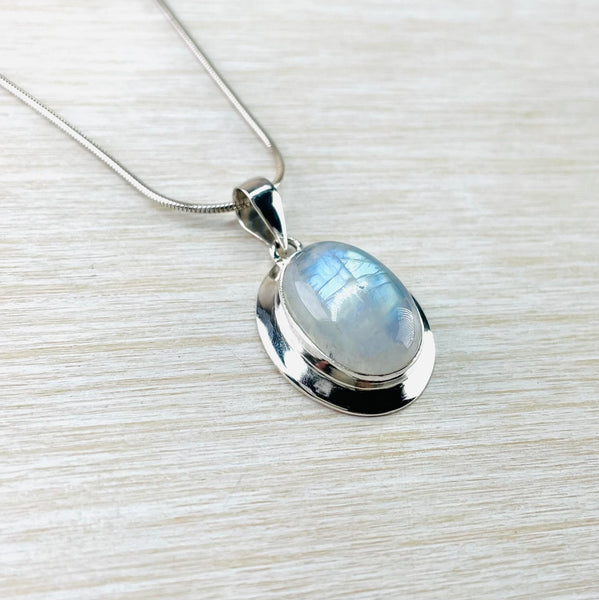 Oval Sterling Silver and Rainbow Moonstone Pendant.