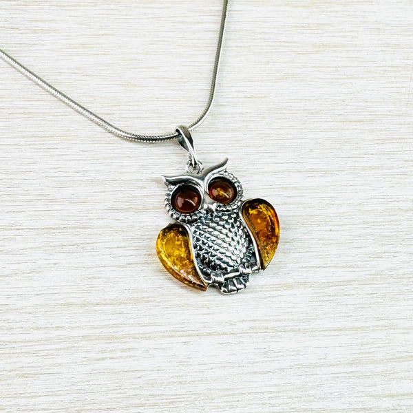 Amber and Sterling Silver Owl Pendant.