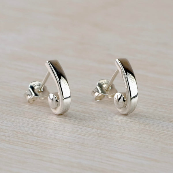 Polished Sterling Silver Curved Stud Earrings by JB Designs.