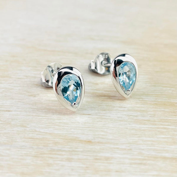 Inverted Tear Drop Blue Topaz and Silver Stud Earrings by JB Designs.