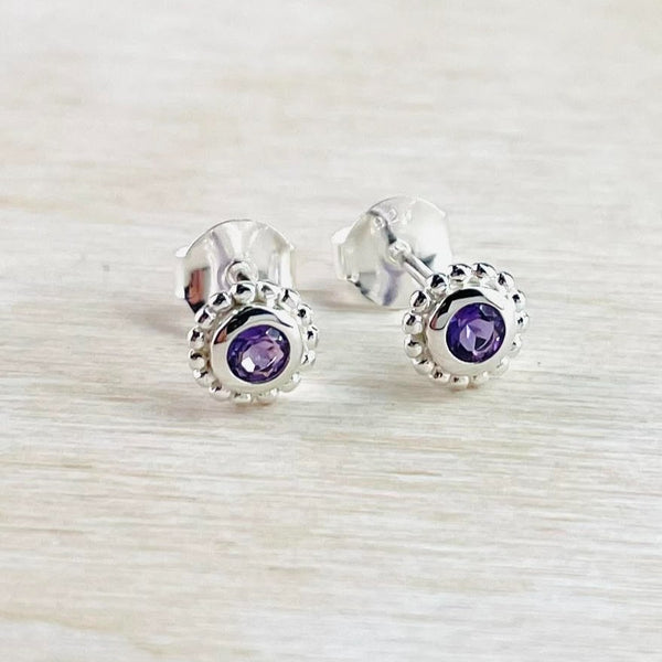 Small Sterling Silver and Amethyst Stud Earrings.