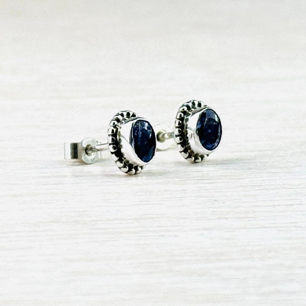 Small Sterling Silver and Tanzanite Stud Earrings.