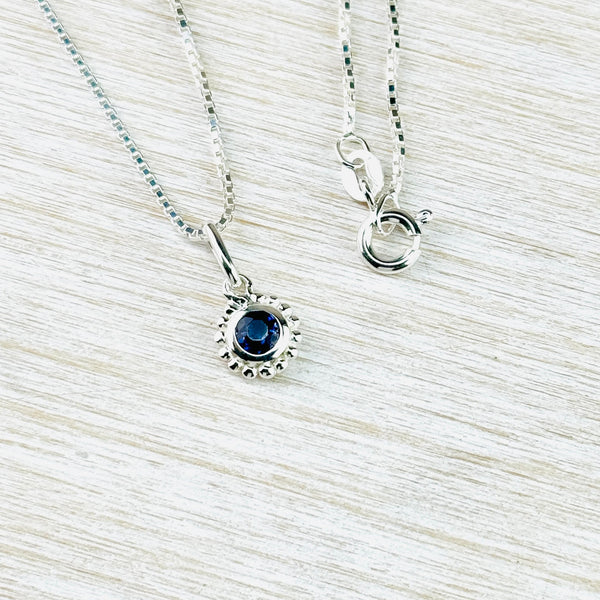 Small Sterling Silver and Iolite Pendant.